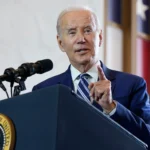 Joe Biden Props, Once More, On The Tent Pole Address